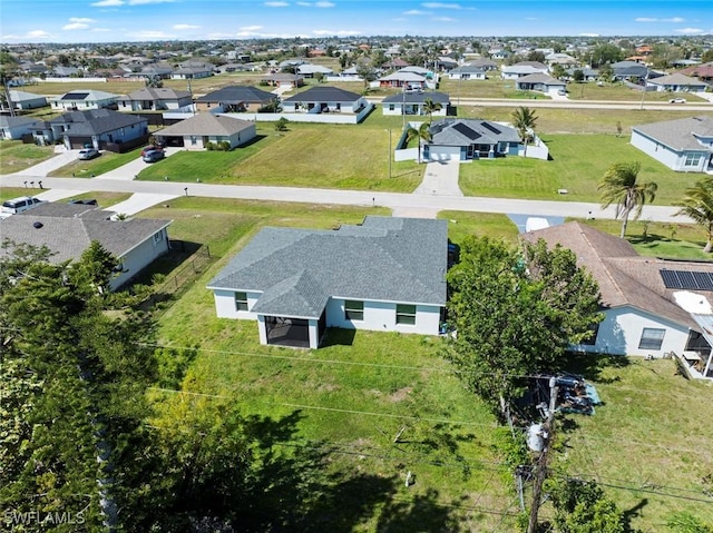 drone / aerial view with a residential view