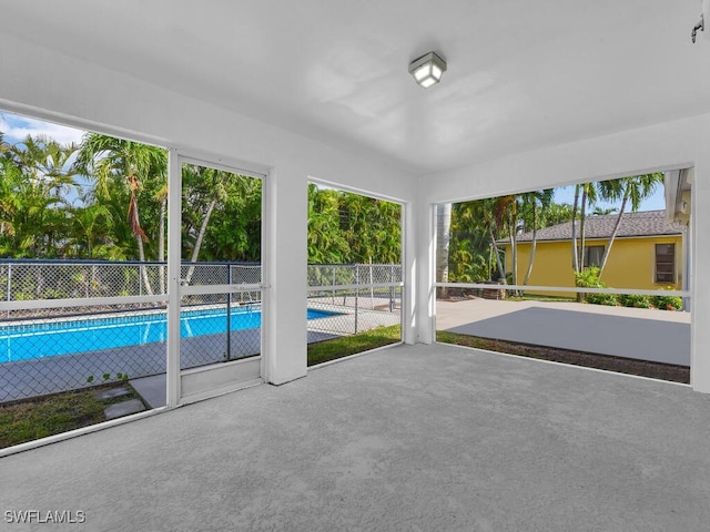 view of pool featuring a patio area, fence, and a fenced in pool