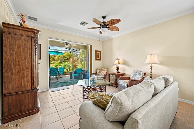 living area with a ceiling fan, visible vents, and ornamental molding