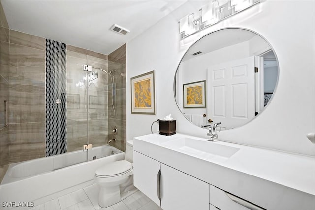 full bathroom featuring combined bath / shower with glass door, visible vents, toilet, and vanity