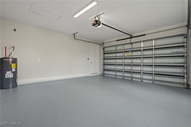 garage featuring water heater, baseboards, and a garage door opener