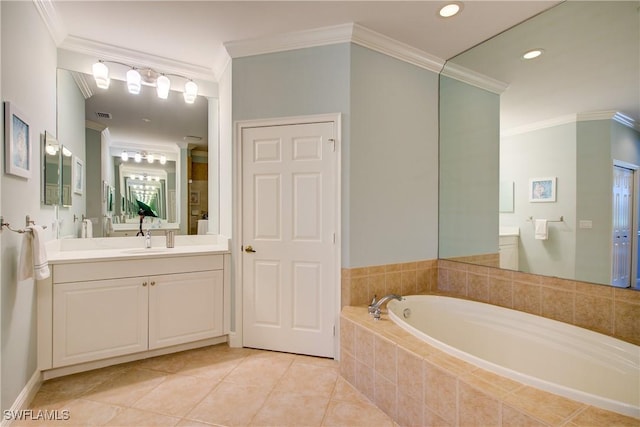 bathroom featuring a garden tub, vanity, visible vents, ornamental molding, and tile patterned floors