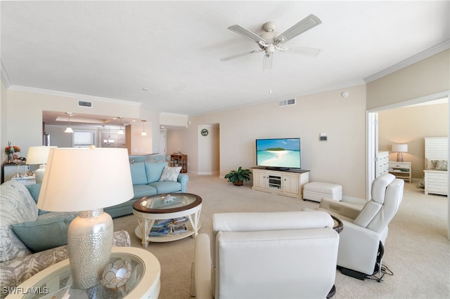 living area featuring ornamental molding, visible vents, and light colored carpet