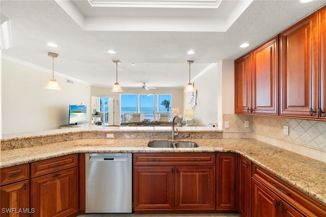 kitchen featuring decorative backsplash, dishwasher, hanging light fixtures, light stone countertops, and a sink