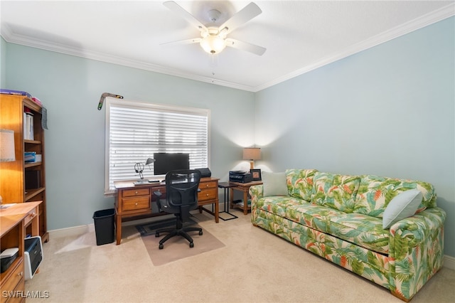 office featuring crown molding, ceiling fan, and light colored carpet