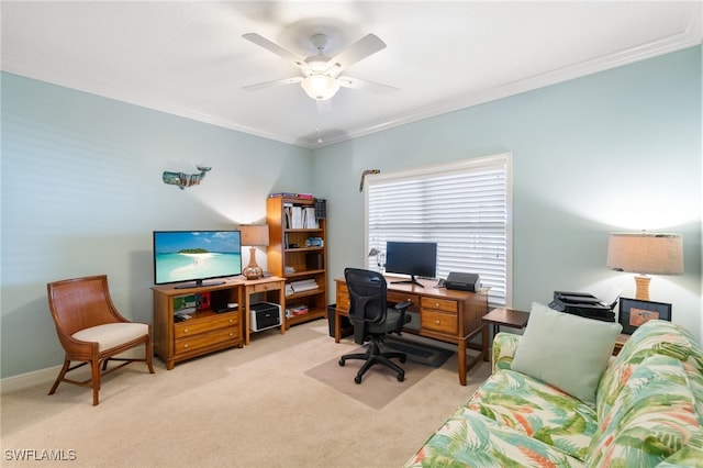 carpeted home office featuring ceiling fan and ornamental molding