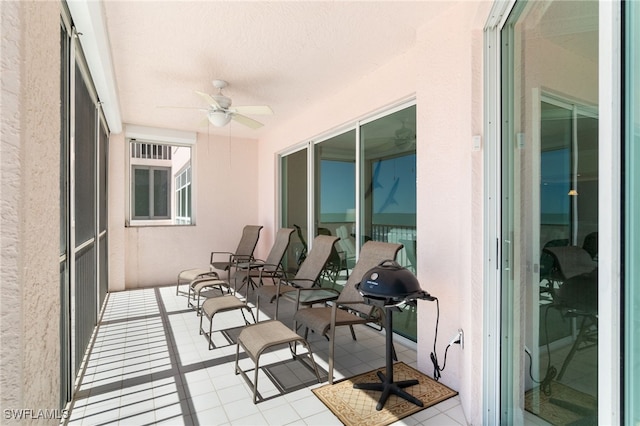 balcony featuring ceiling fan