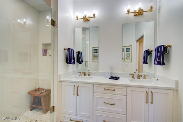 bathroom with double vanity, a sink, and a shower stall