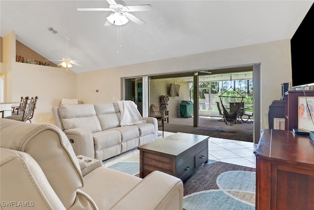 living room with lofted ceiling, visible vents, ceiling fan, and tile patterned floors