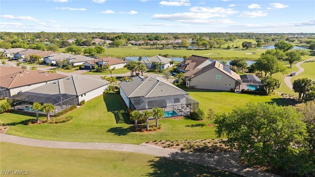 bird's eye view featuring a residential view and a water view