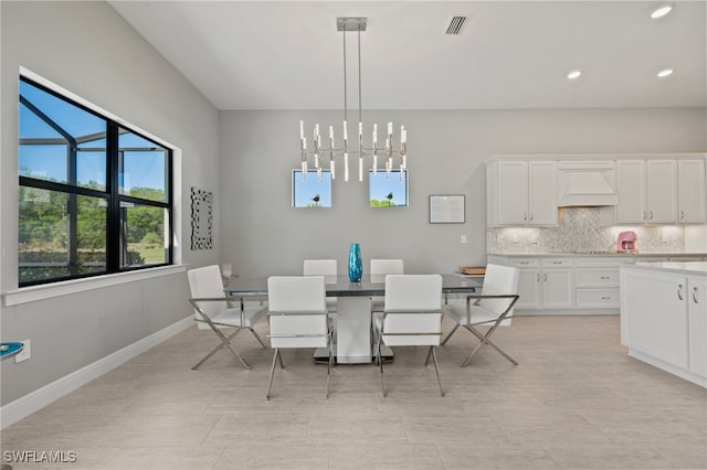 dining space with recessed lighting, a notable chandelier, baseboards, and visible vents