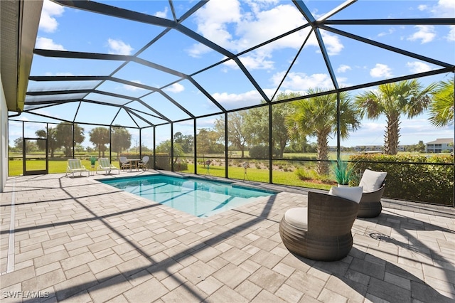 pool featuring a patio area and a lanai