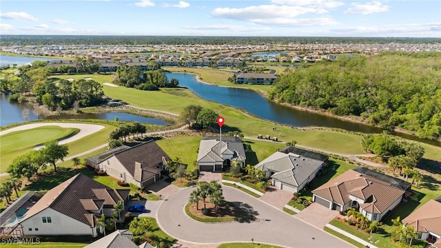 bird's eye view featuring a residential view, golf course view, and a water view