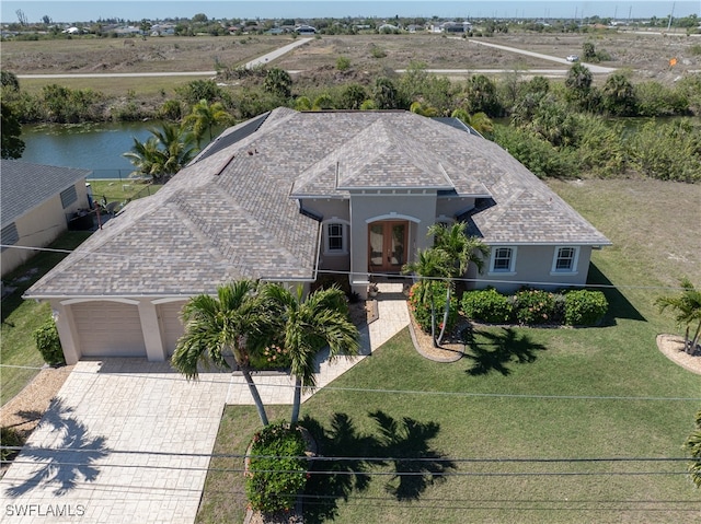 drone / aerial view with a water view