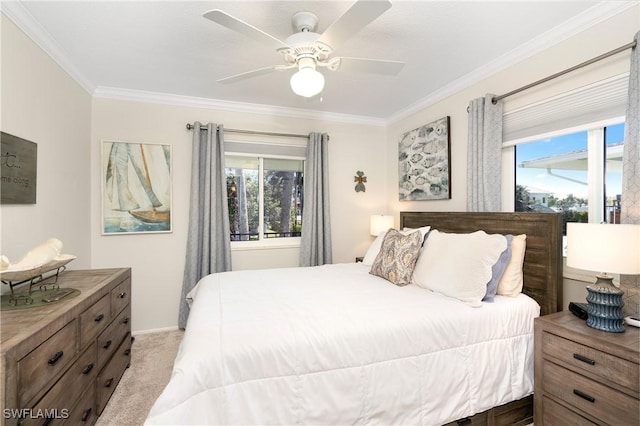 carpeted bedroom with a ceiling fan, multiple windows, and crown molding