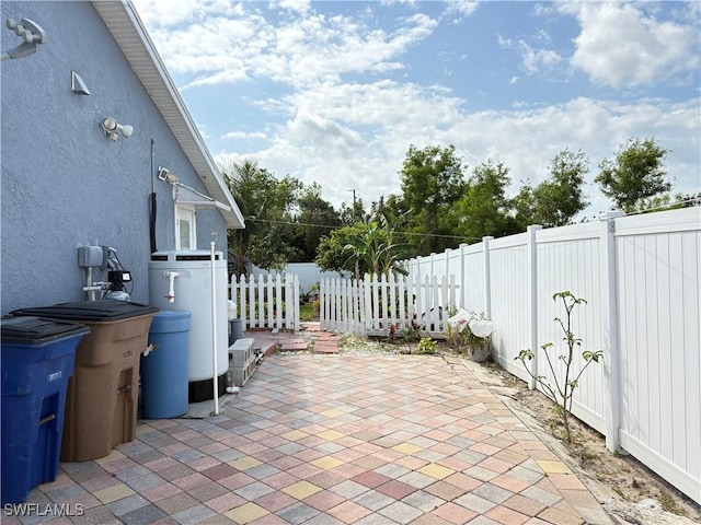 view of patio / terrace featuring fence