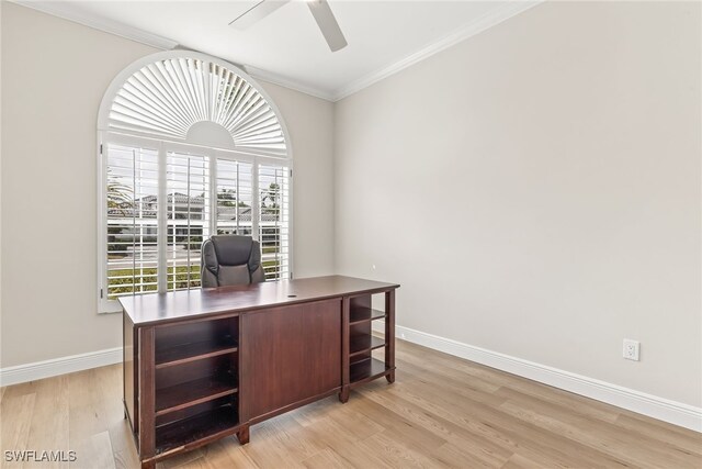 office area with ceiling fan, baseboards, light wood-style flooring, and crown molding