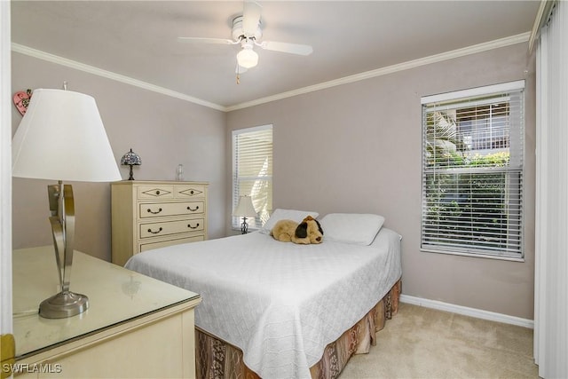 bedroom with baseboards, multiple windows, light colored carpet, and crown molding