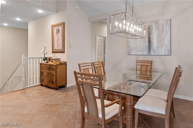 dining space featuring baseboards and recessed lighting