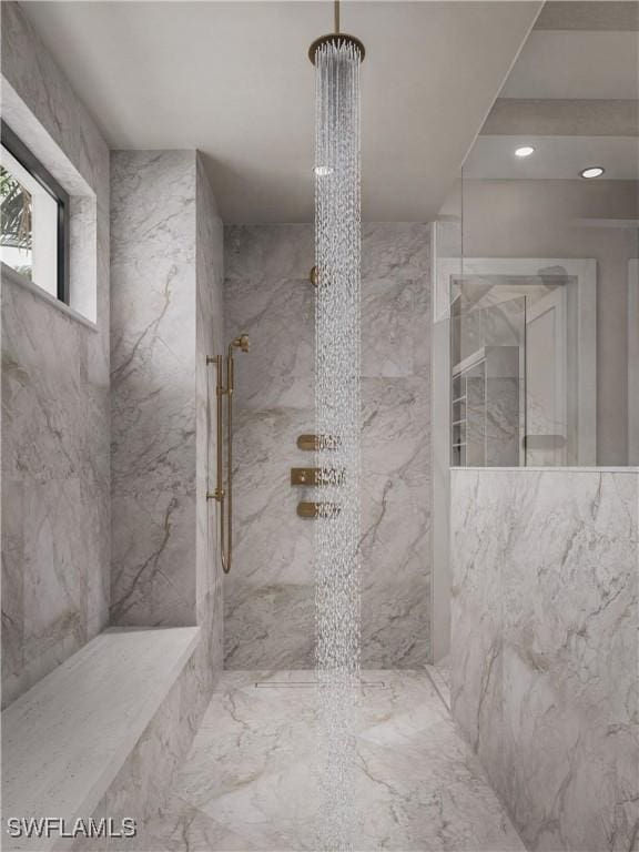 bathroom featuring recessed lighting, marble finish floor, and a marble finish shower