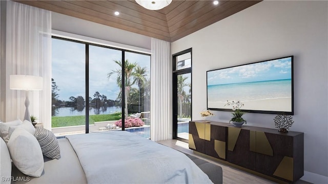 bedroom with recessed lighting, multiple windows, and access to outside