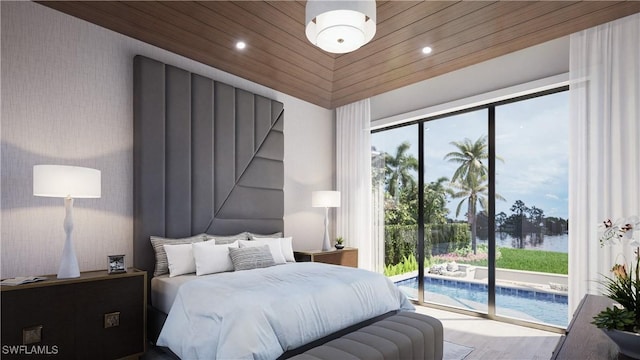 bedroom featuring access to exterior, recessed lighting, and wood finished floors