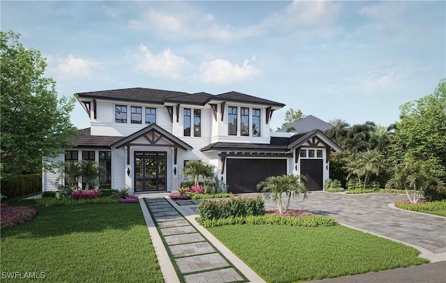 view of front of home featuring a garage, stucco siding, decorative driveway, and a front lawn