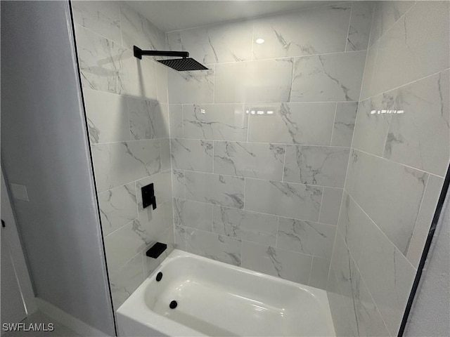 bathroom with shower / bathing tub combination