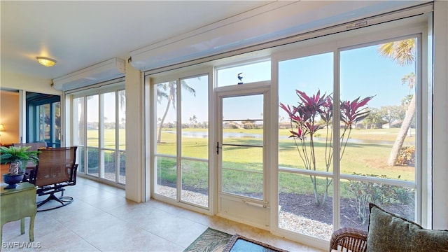 sunroom featuring tile patterned floors