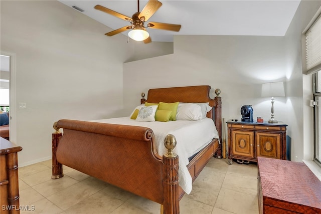 bedroom with light tile patterned floors, lofted ceiling, visible vents, baseboards, and a ceiling fan