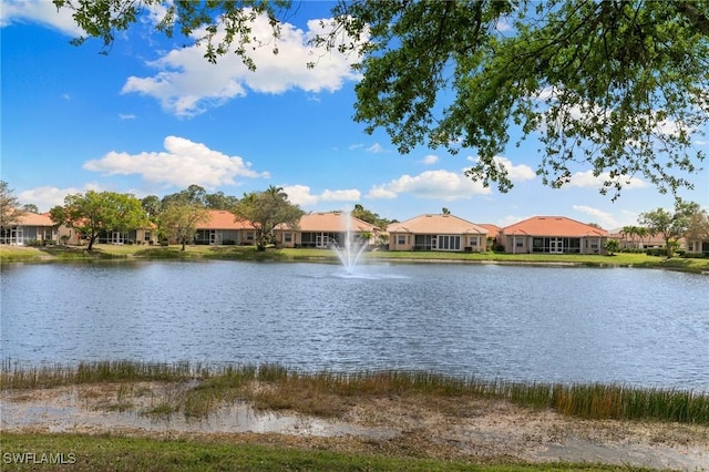 view of water feature with a residential view