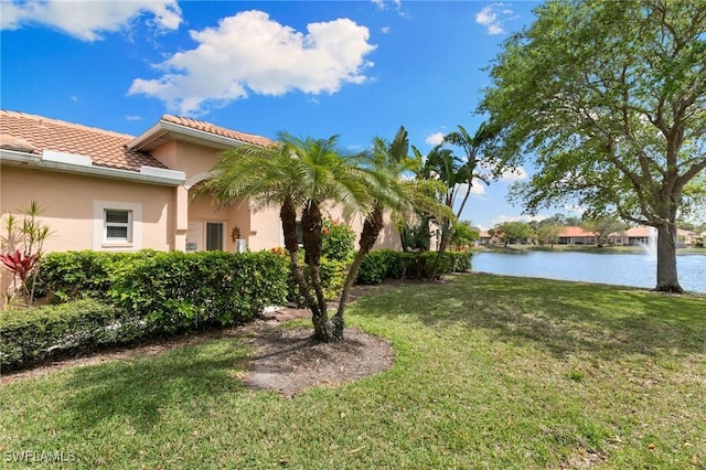 view of yard featuring a water view