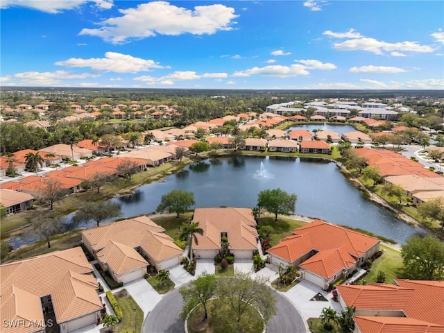 aerial view with a water view and a residential view