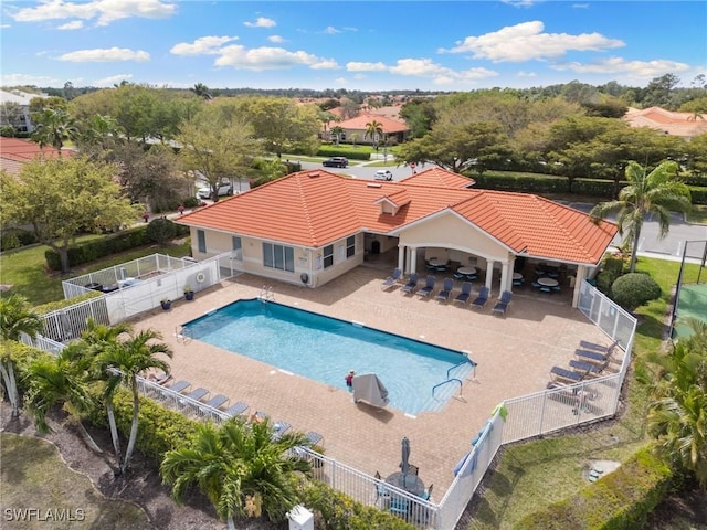 pool featuring a patio area and a fenced backyard