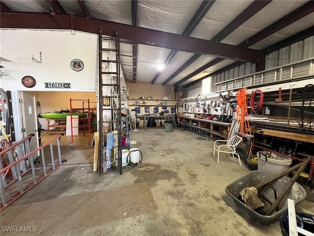 garage with a workshop area