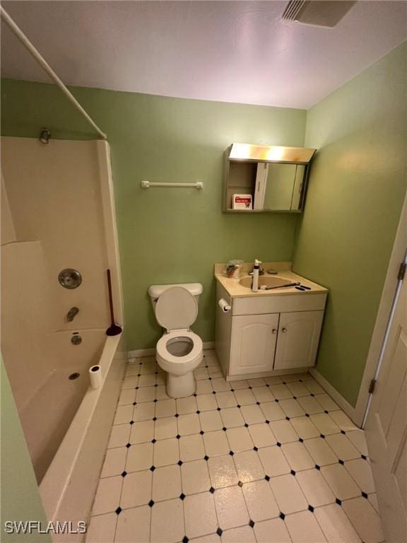 full bathroom featuring toilet, bathtub / shower combination, baseboards, and vanity