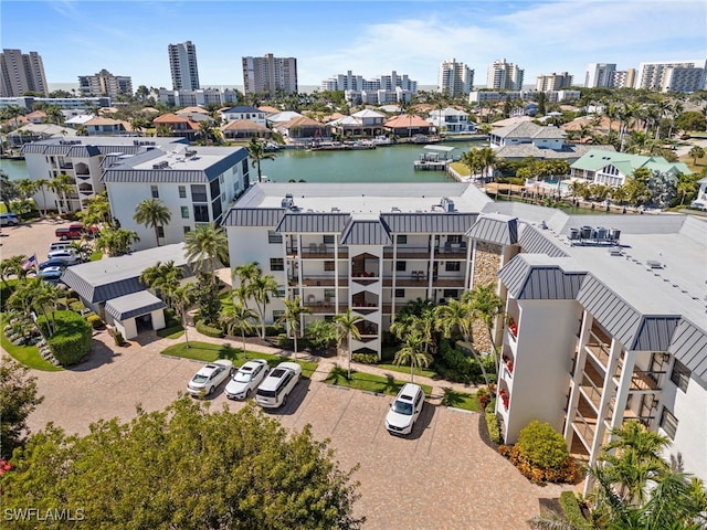 bird's eye view with a view of city and a water view