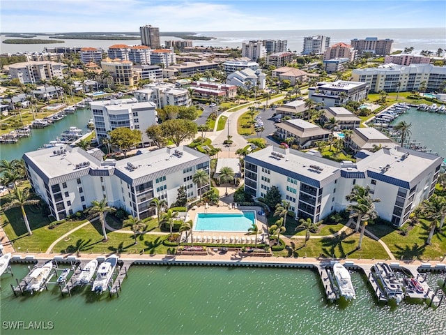 aerial view featuring a water view and a city view