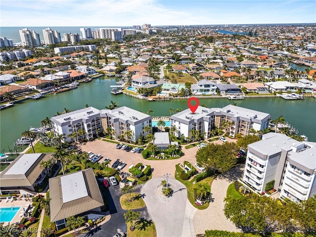 birds eye view of property featuring a water view