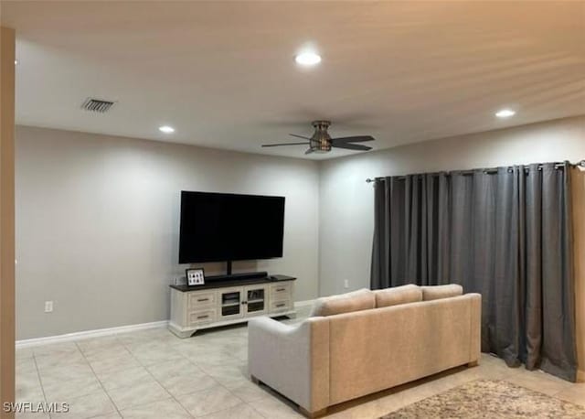 living room with light tile patterned floors, recessed lighting, visible vents, ceiling fan, and baseboards