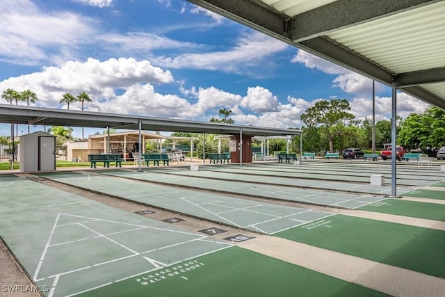 view of home's community with shuffleboard