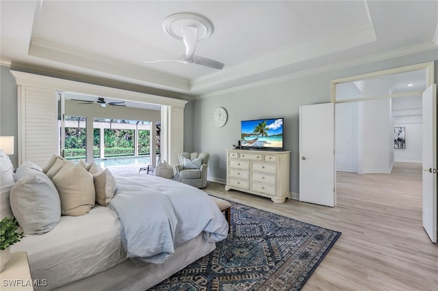 3311 Creekview Dr, Bonita Springs, FL 34134 - bedroom with a raised ceiling, ornamental molding, light wood finished floors, access to outside, and baseboards