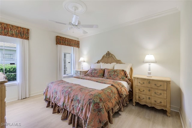 3311 Creekview Dr, Bonita Springs, FL 34134 - bedroom with light wood-style flooring, crown molding, baseboards, and a ceiling fan