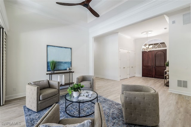 3311 Creekview Dr, Bonita Springs, FL 34134 - living area with light wood finished floors, a chandelier, baseboards, crown molding, and ceiling fan