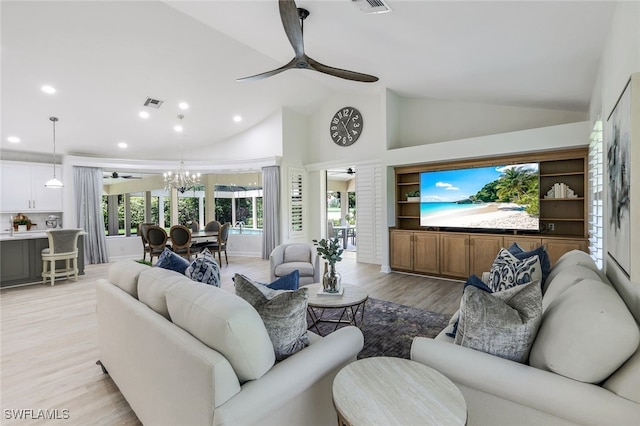 3311 Creekview Dr, Bonita Springs, FL 34134 - living room with ceiling fan, light wood-style flooring, recessed lighting, a chandelier, and high vaulted ceiling