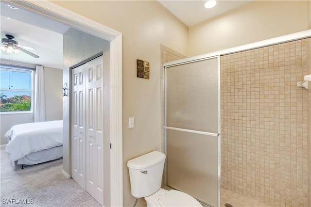 ensuite bathroom with ensuite bath, a shower stall, toilet, and a ceiling fan