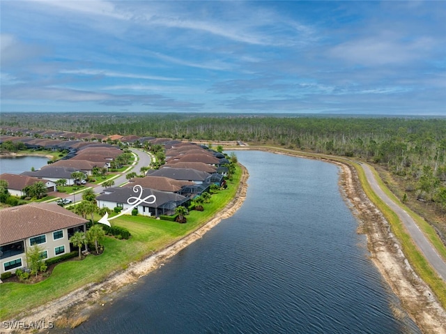 aerial view with a residential view and a water view