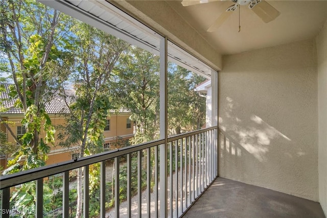 balcony featuring ceiling fan