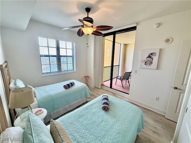 bedroom with access to outside, light wood-type flooring, a ceiling fan, and baseboards