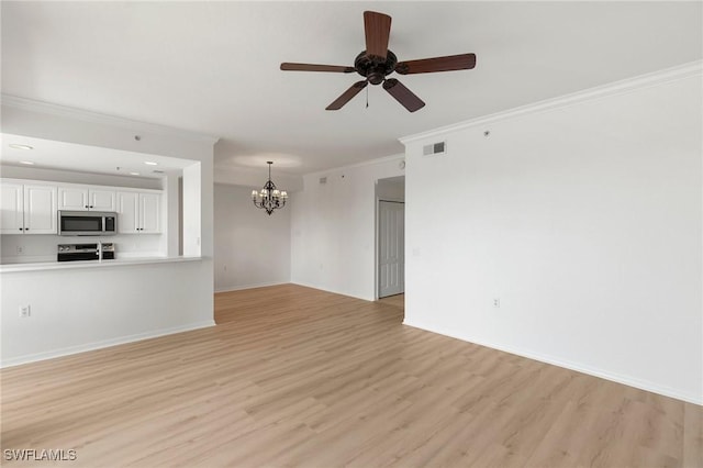 unfurnished living room with visible vents, baseboards, light wood-style floors, and ornamental molding